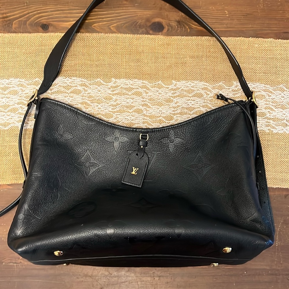 Black emptied leather Louis Vuitton Carryall